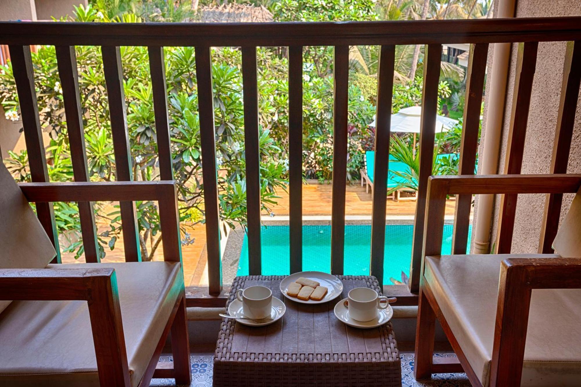 Super Deluxe Pool View Room Balcony complimentary Kayaking on Massage session Happy Hours 21 from 11 am to 8 pm on selected brands